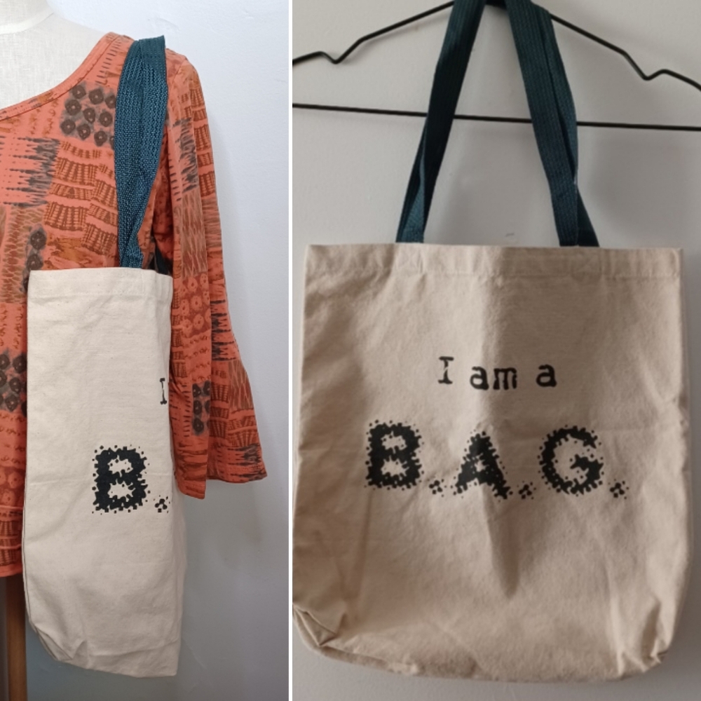 I am a B.A.G. Canvas Tote Shoulder Bag with Dark Green Straps